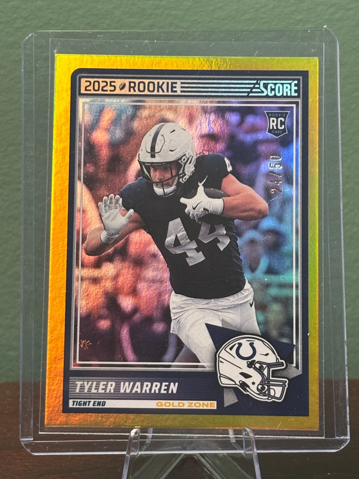 2025 Panini Score - Rookies Tyler Warren #21 Gold Zone 24/50 (RC)