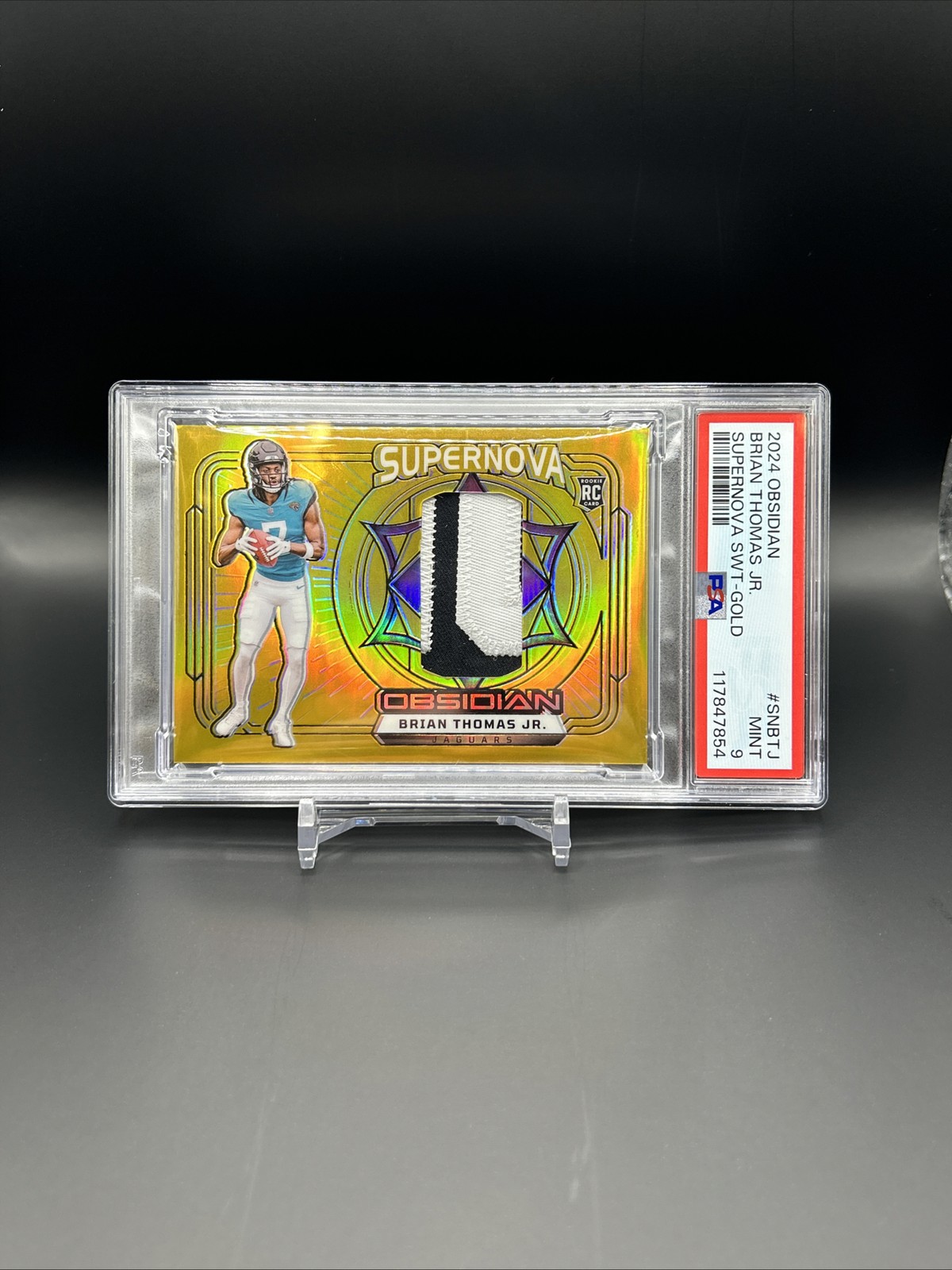 Brian Thomas Panini Obsidian Supernova Swatches #SNBTJ Gold