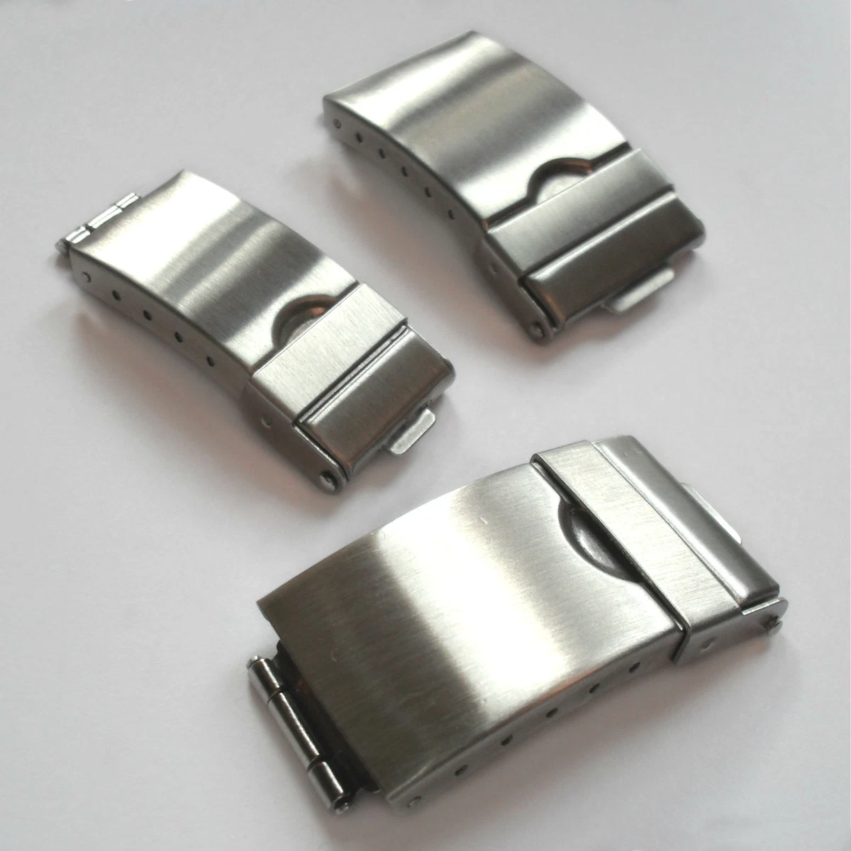 Fold over clasp with safety sale