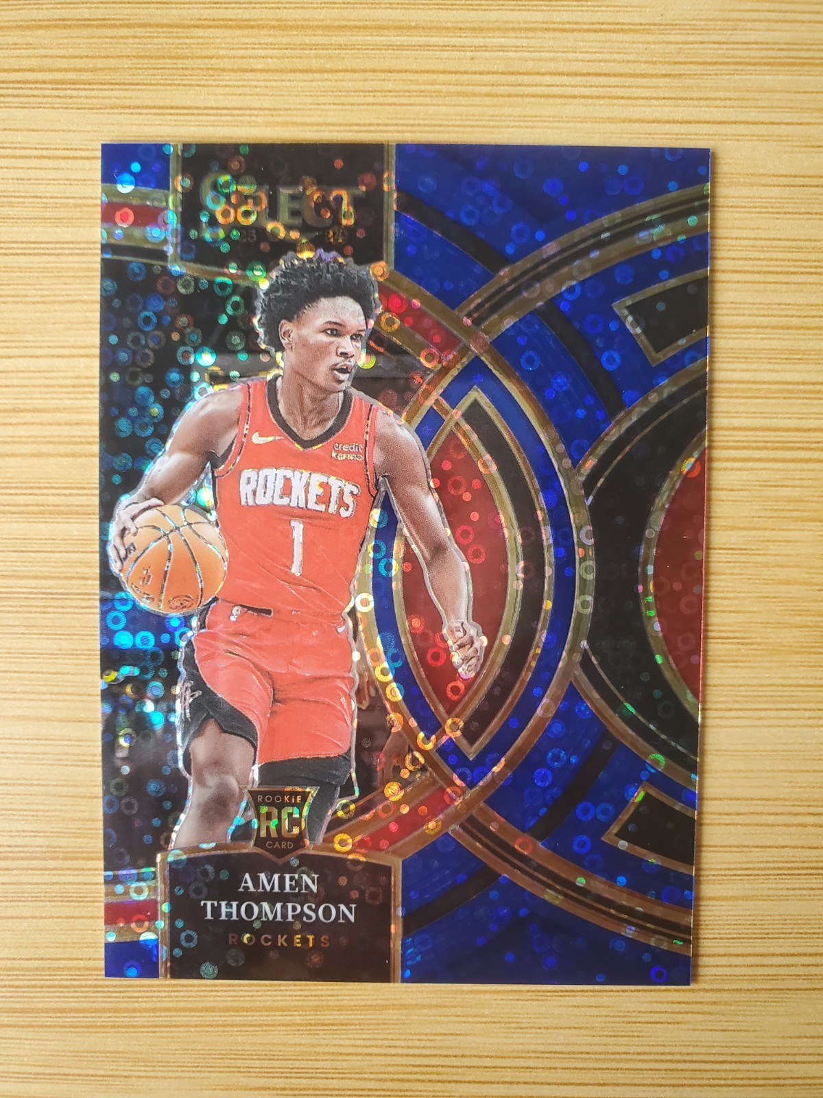 2023-24 SELECT #122 AMEN THOMPSON PREMIER LEVEL ROOKIE BLUE DISCO RC /25 Panini