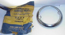 Buick 5941116 Original 1946-1949 Parking Lamp Bezel Door New Old Stock Buick 5941116 Original 1946-1949 Parking Lamp Bezel Door New Old Stock