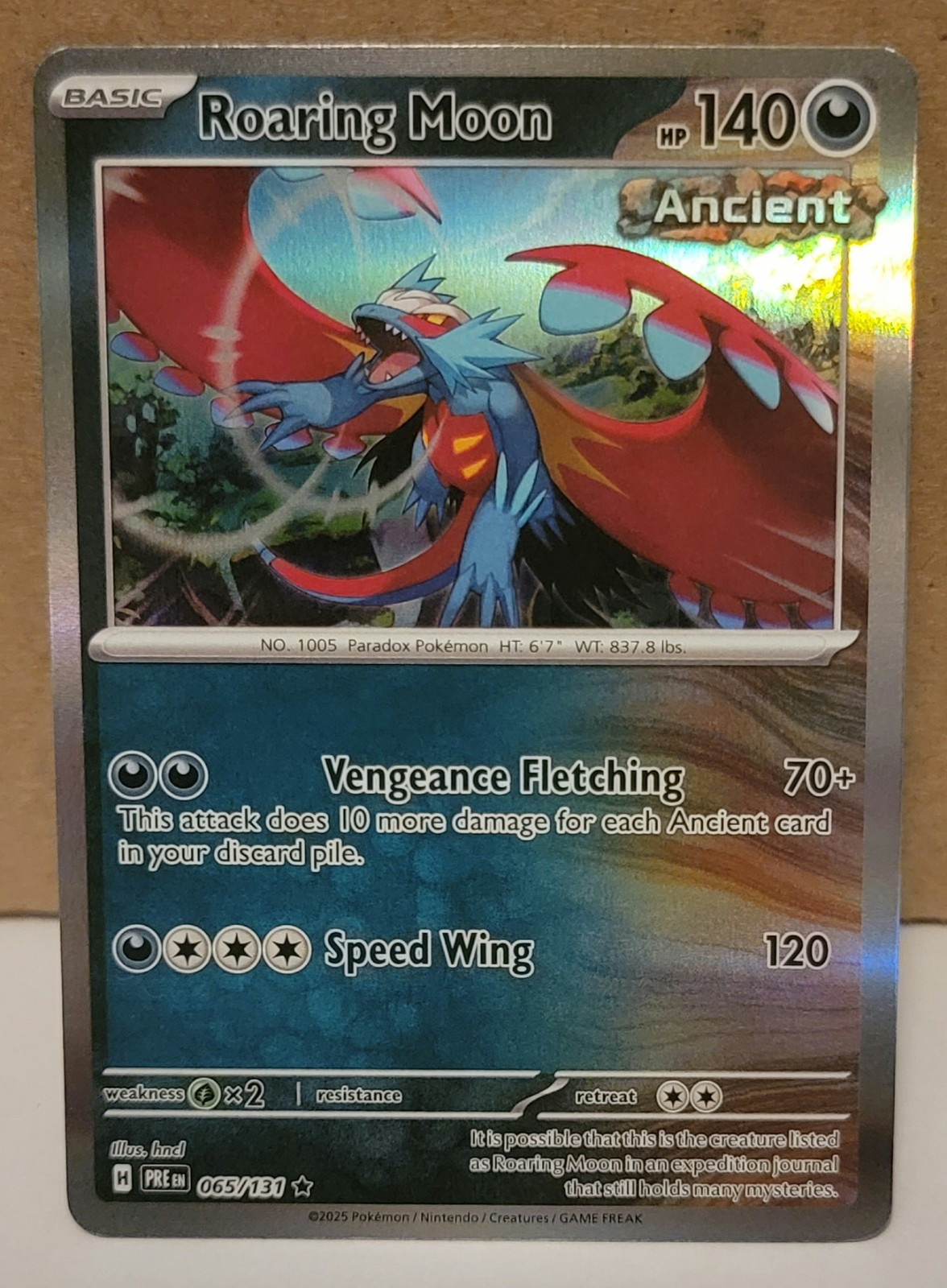 Pokemon TCG Card - 065/131 Roaring Moon - Prismatic Evolutions - Rare Holo NM