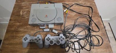 Sony PlayStation 1 Video Game Console, Cords, & Controllers - Gray