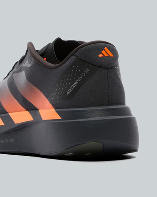adidas ADIZERO EVO SL Trainers in Carbon / Black Lucid Orange