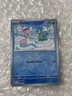 Pokémon TCG Shellos 046/191 Sv08: Surging Sparks Reverse Holo NM