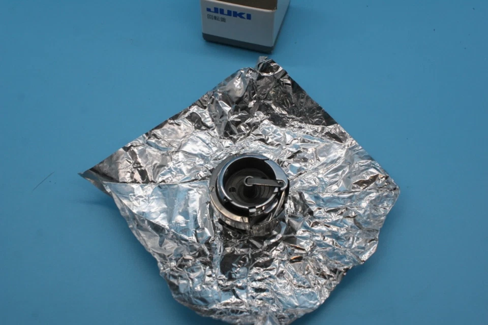 Gancho de gran capacidad genuino Juki 107-61252 LU-2210N, LU-2260N pie para caminar Foto 2 de 3