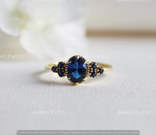 3 CT Oval Cut Lab-Created Blue Sapphire Halo Wedding Ring 14K Yellow Gold Plated