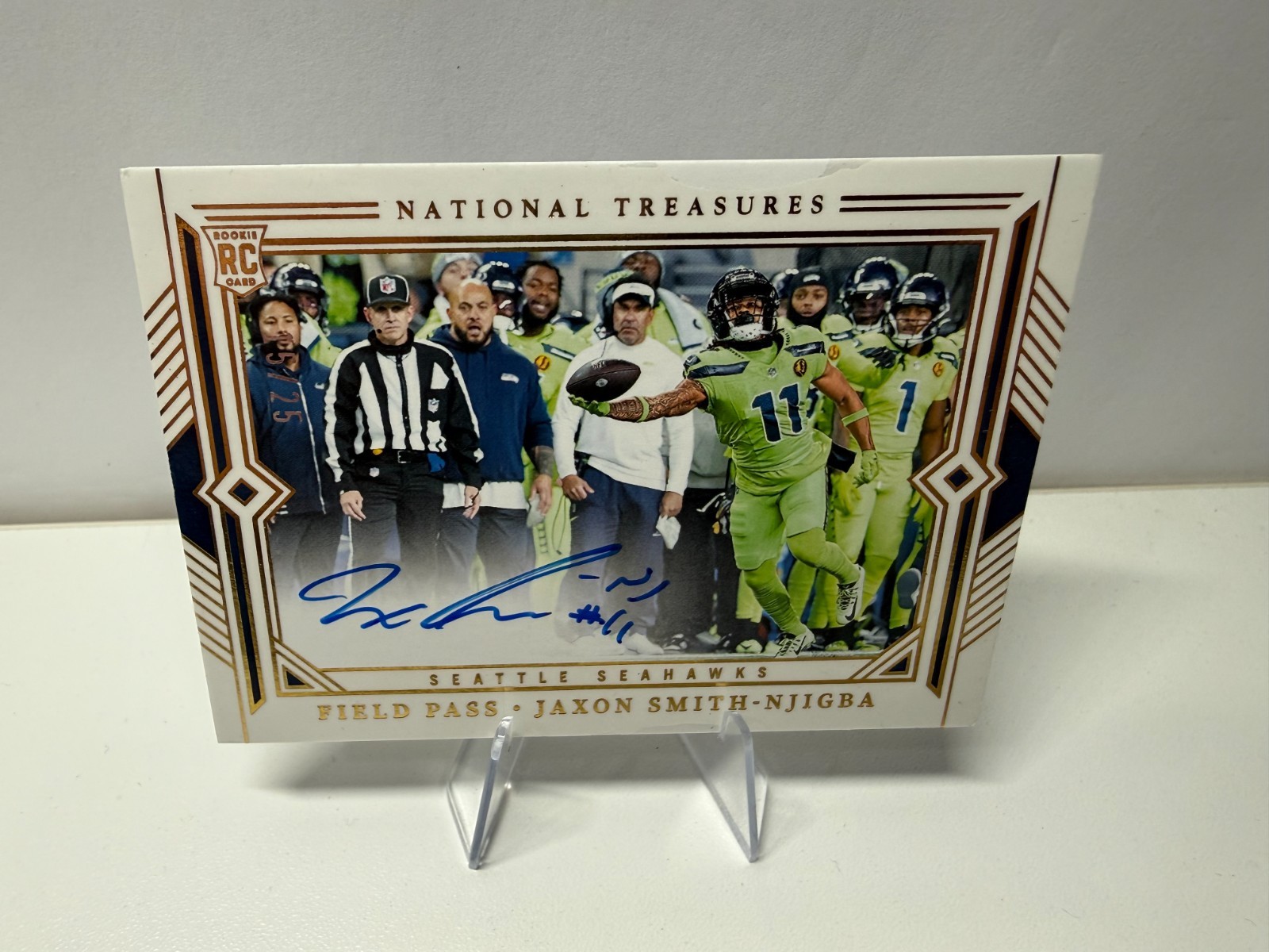 Jaxon Smith-Njigba 2023 Panini National Treasures Field Pass Gold RC Auto /25