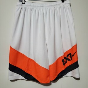 black orange and white nike shorts