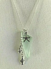 FROSTED AQUA ICE SEA GLASS PENDANT NECKLACE WITH CHARMS AND SILVER TONE CHAIN
