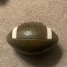 Prepped and tackified Official size Wilson GST NCAA leather Football