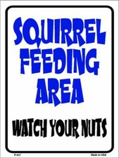 Squirrel Feeding Area Novelty Metal Sign