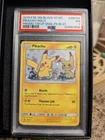 Pokemon Pikachu Team UP Blister Pk. Black Star Holo Promo SM162 PSA 7