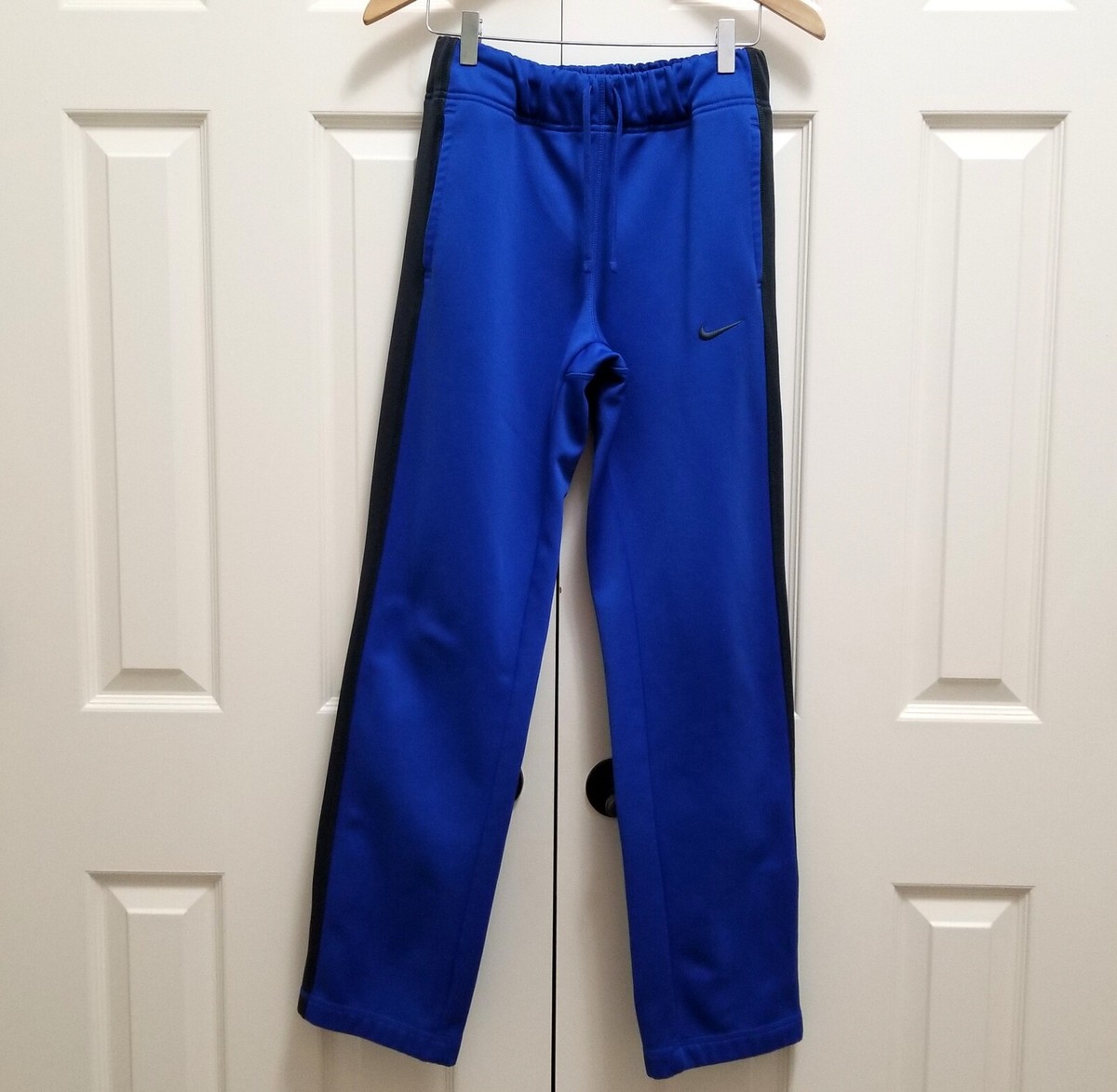 nike training therma track pants blue