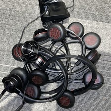 7- Plantronics Voyager Headsets With 2 Stands Only