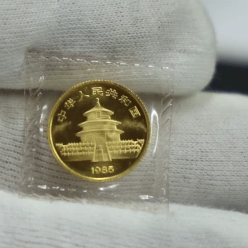 Moneda de oro China 1985 1/10 oz 10 yuanes sin circular en plástico original Foto 2 de 2