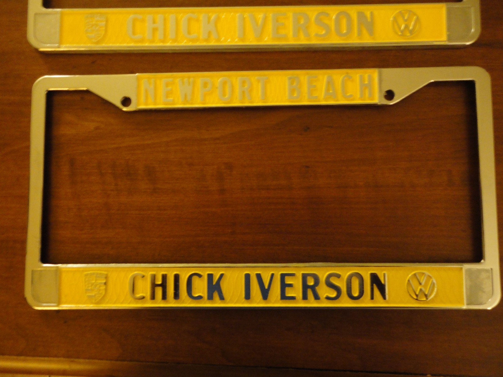VW Chick Iverson Dealer License Plate Frame NEW Newport Beach, Yellow