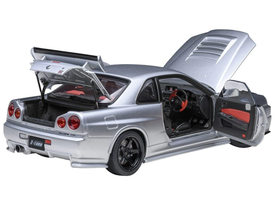 COCHE MODELO NISSAN NISMO R34 GT-R Z-TUNE RHD PLATEADO 1/18 AUTOART 77461 Foto 2 de 4