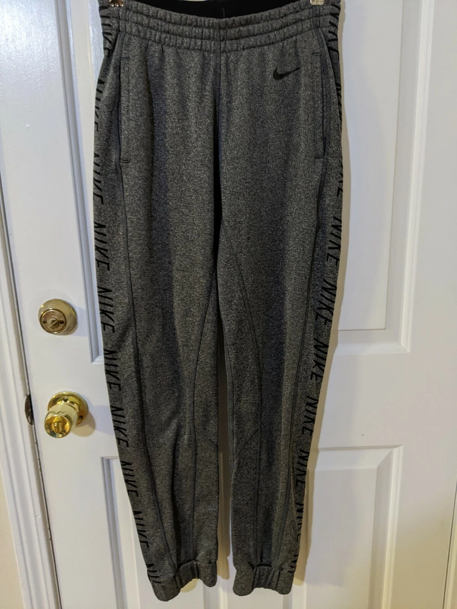 Nike sweatpants online with zipper bottom