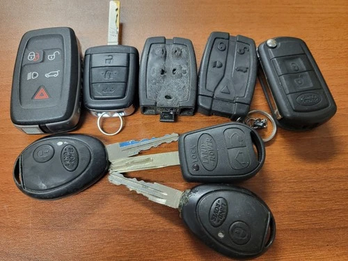 Lot of 8 OEM Land Rover Range Rover Key Fobs Remotes Smart Keys Mixed Used - product listing photo