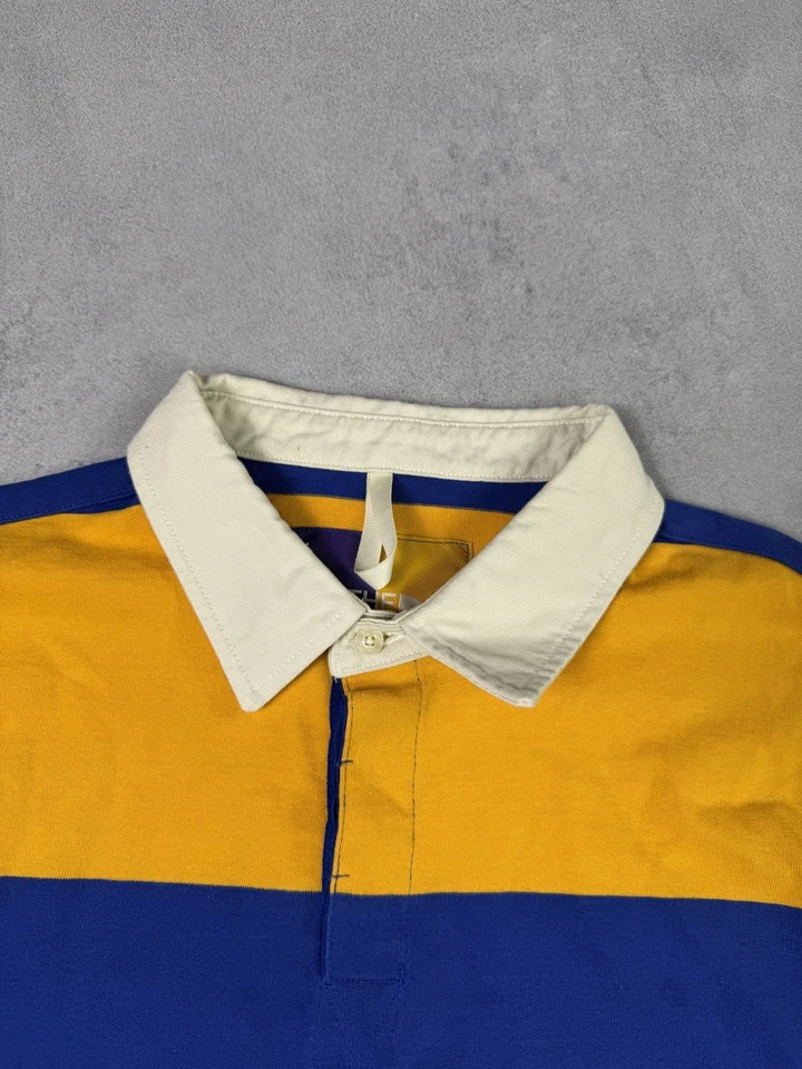 Polo de rugby The North Face bloques de colores azul/dorado talla L a rayas Foto 2 de 4