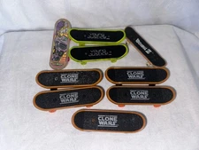 Lot Of 9 Finger Boards Tech Decks Clone Wars Dragonballz Young Justice Used
