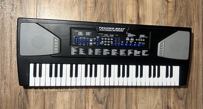 Techno Beat Electronic Keyboard Battery Operated With No Mic Keys Marked