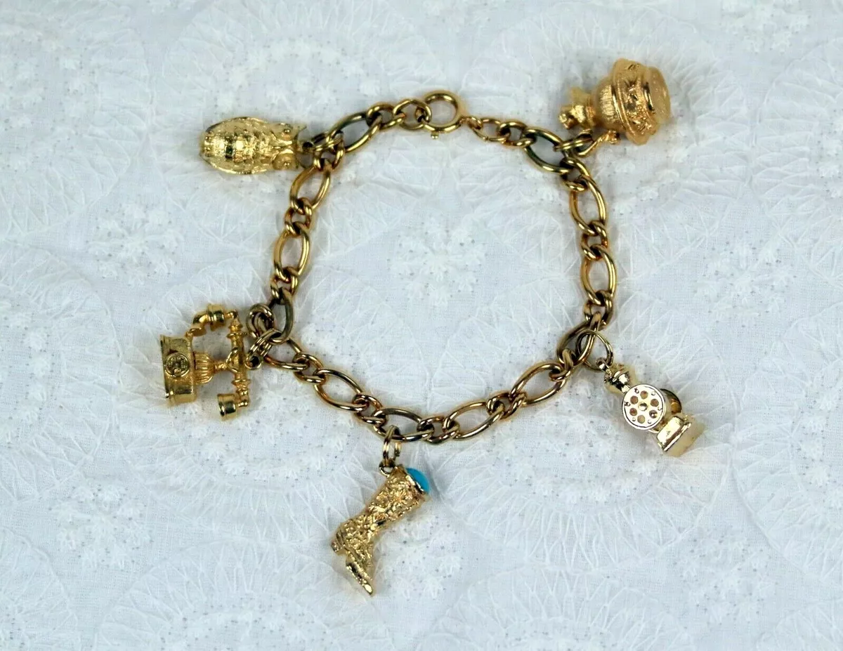 Vintage avon shop charm bracelet