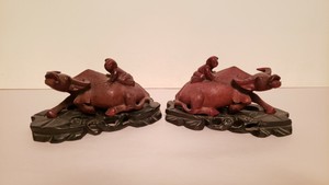 Antique Chinese Ox water buffalo rosewood carvings set of two with stands 19th c