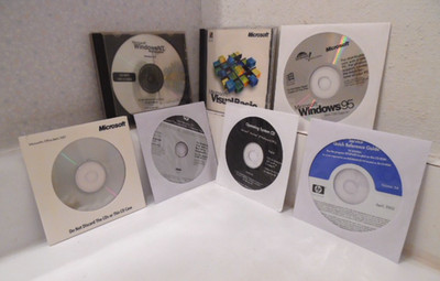 7  Microsoft  & HP Software CDs - Windows NT, Windows 95, Visual Basic, etc.