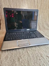 HP Compaq QC60 Notebook Laptop Computer, Has Dell Charger For A Power Cord