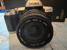 Sigma SA-300 SLR Camera w/ Sigma UC Zoom 28-105mm 1:4 5.6  Battery Untested H3