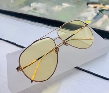 Fashion Unisex Aviator Gold Metal sunglasses with UV400 light yellow lens..