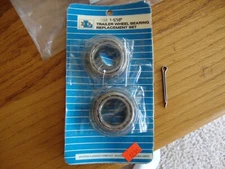 dutton lainson 1  1/16" trailer bearing set with two cotter pins.