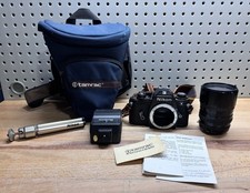 Nikon EM 35mm SLR Film Camera, 28-80mm Lens, Nikon Strap Tripod, Owners Manual