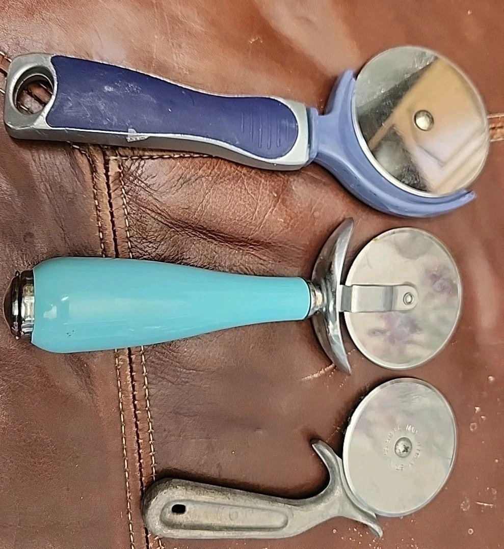3 pizza cutters
Opens in a new window or tab