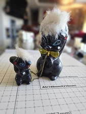 Kitsch mid century skunk mom and baby Japan