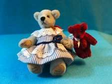 A LITTLE 2 1/2" GREY PLUSH TEDDY BEAR FULLY JOINTED BY WORLD OF MINIATURE BEARS