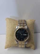 Armitron Mens Watch Two Tone Day Date Quartz NEW BATTERY Running Stainless Steel