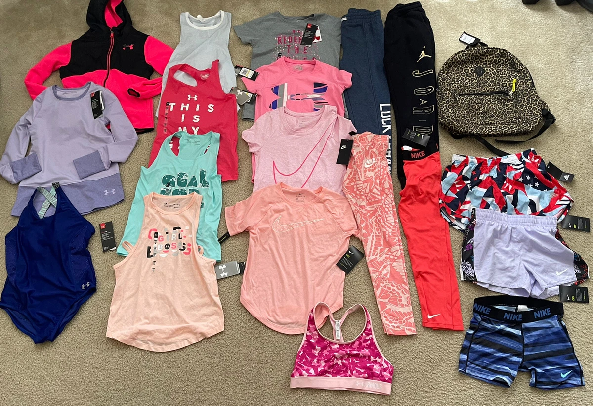 Lot of girls clothes(under armour, nike etc)-size medium