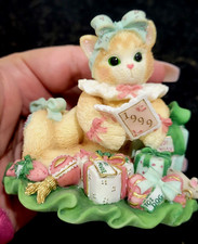 ENESCO Calico Kittens. Kitten wrapped in bells dated figurine.1999