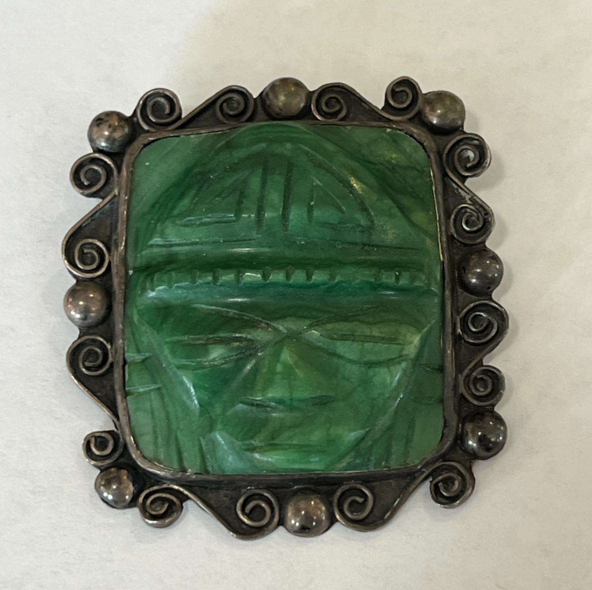 Vintage Casa Prieto Sterling Silver and Malachite Tribal Face Brooch