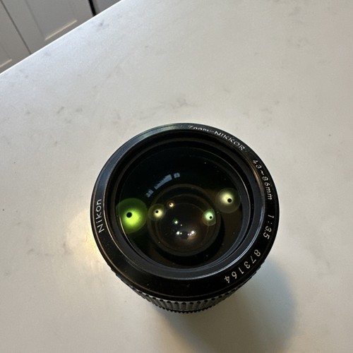 Appareil Photo Reflex Nikon EM 35mm + Objectif Nikkor 43-86mm F/3.5 - Testé Fonctionnel