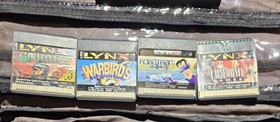 Atari Lynx 1 console working with box and 4 games.