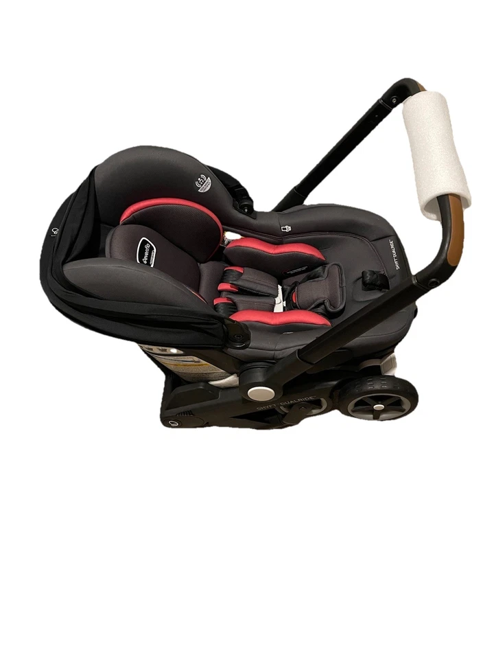 Combo de asiento de coche y cochecito infantil Evenflo Shyft DualRide rosa leer descripción Foto 2 de 4