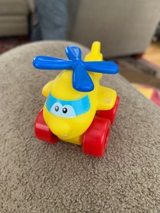 yellow toy helicopter