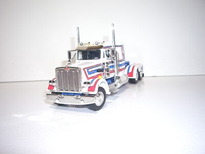 DCP FIRST GEAR 1/64 WHITE, RED, BLUE STRIPED PETERBILT 359 WITH 36'' SLEEPER