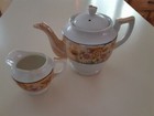 collectible tea pot and creamer in great condition. Made in Japan