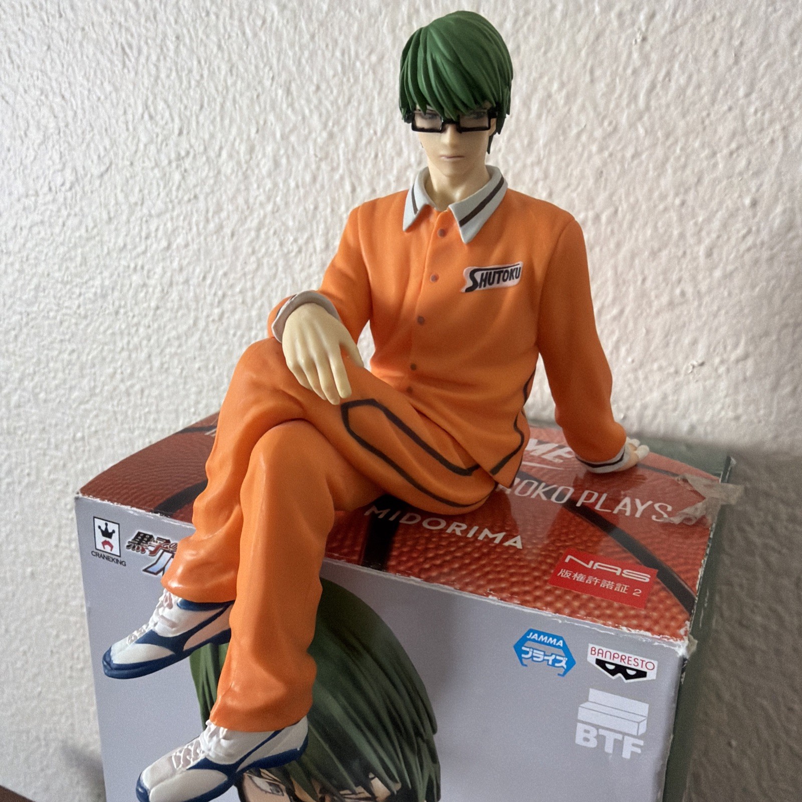 Figura de baloncesto Kuroko’s Shintaro Midorima Break Time Shutoku caja abierta