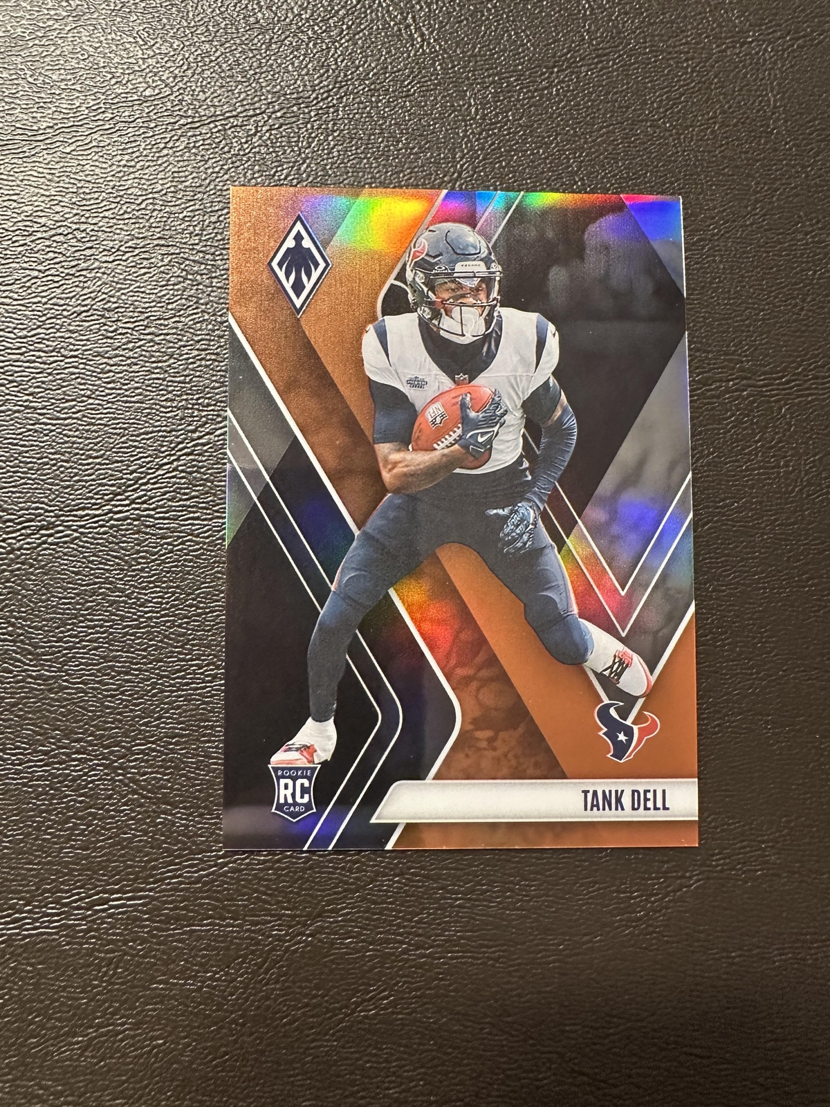 2023 Panini Phoenix Tank Dell #135 Orange Prizm /99 Rookie RC Houston Texans